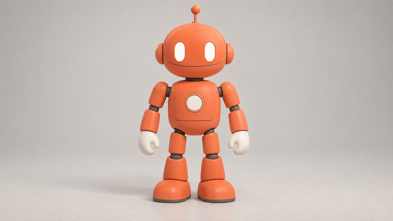 Robot naranja original, de cuerpo entero, sobre un fondo de estudio